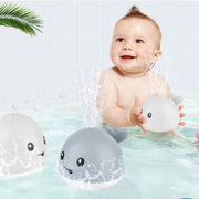 Neues Baby-Badezimmer, elektrisches Induktions-Wal-Spray, kleines Spielzeug