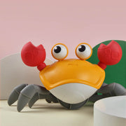 Krabbelspielzeug mit elektrischem Sensor